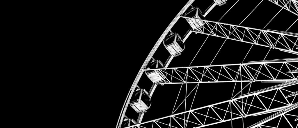 Black ferris wheel representing personal growth